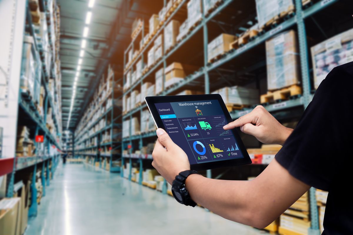Warehouse manager with tablet