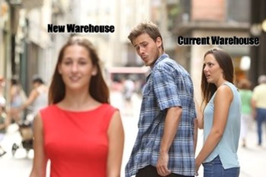 Group of people, current warehouse jealous of new warehouse